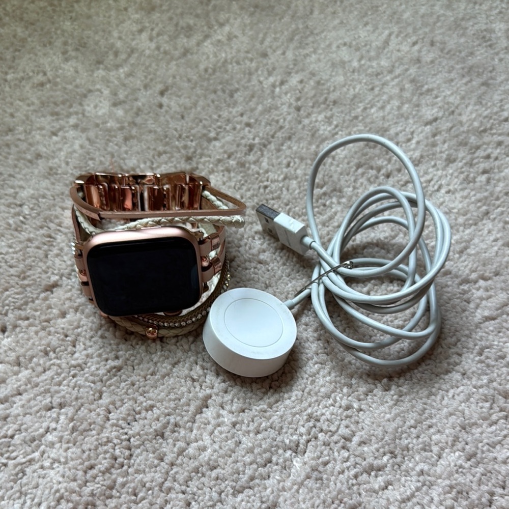 Apple Smartwatch series 3 with chargers as accessories